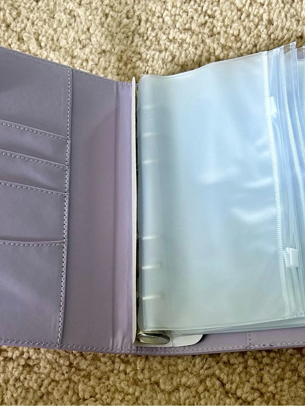 Lilac color budget binder with magnetic closure.